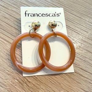 Francesca’s light pink hoop earrings